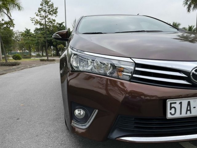 Cần bán lại xe Toyota Corolla Altis 1.8G AT sản xuất 2014, màu nâu 1