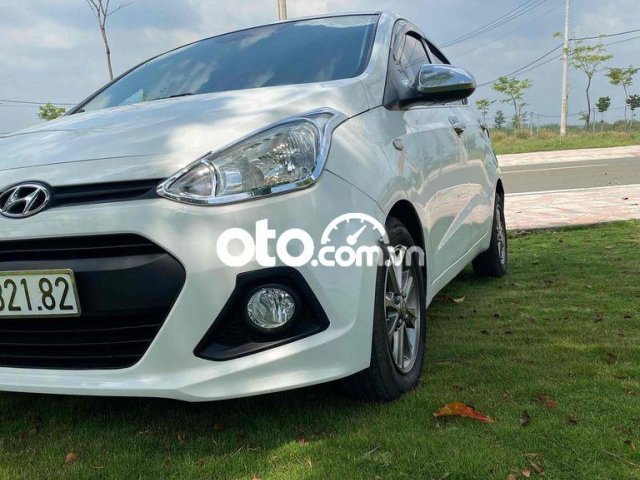 Cần bán Hyundai Grand i10 sản xuất 2014, màu trắng, nhập khẩu nguyên chiếc