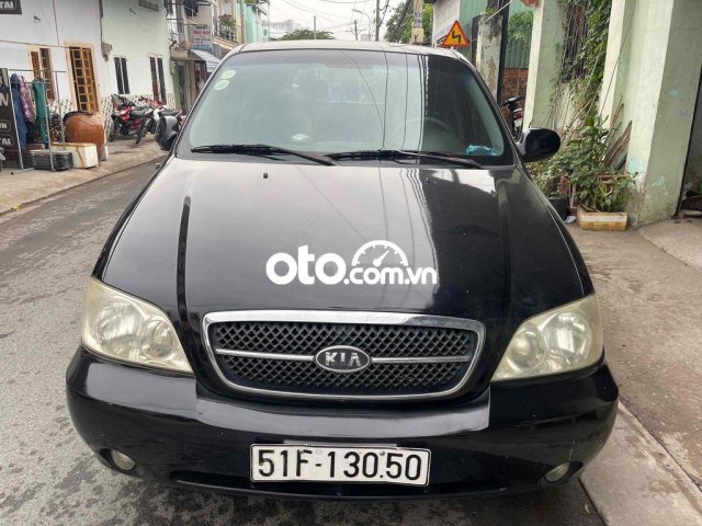 Bán Kia Carnival 2.7MT sản xuất 2006, màu đen0