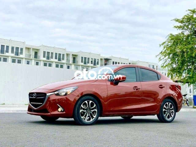 Bán ô tô Mazda 2 Hatchback 1.5AT năm 2017, màu đỏ