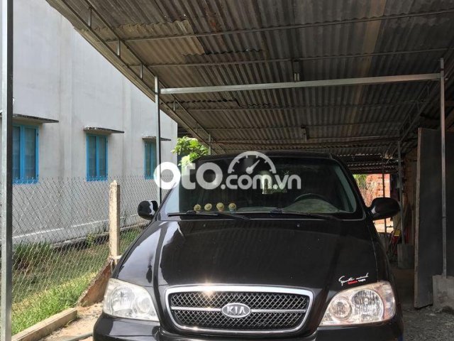 Bán ô tô Kia Carnival sản xuất năm 2006, màu đen0