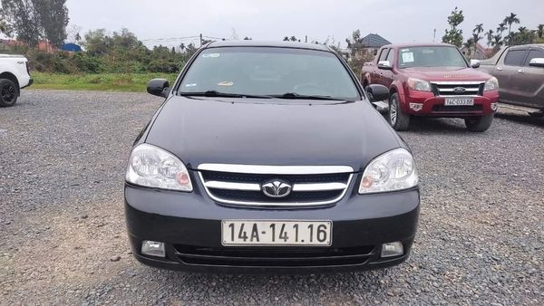 Bán ô tô Daewoo Lacetti EX năm 2010, màu đen xe gia đình, 165 triệu