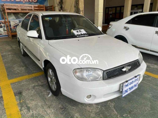 Cần bán gấp Kia Spectra sản xuất năm 2004, màu trắng 