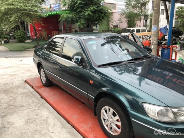 Cần bán Camry nồi đồng cối đá0