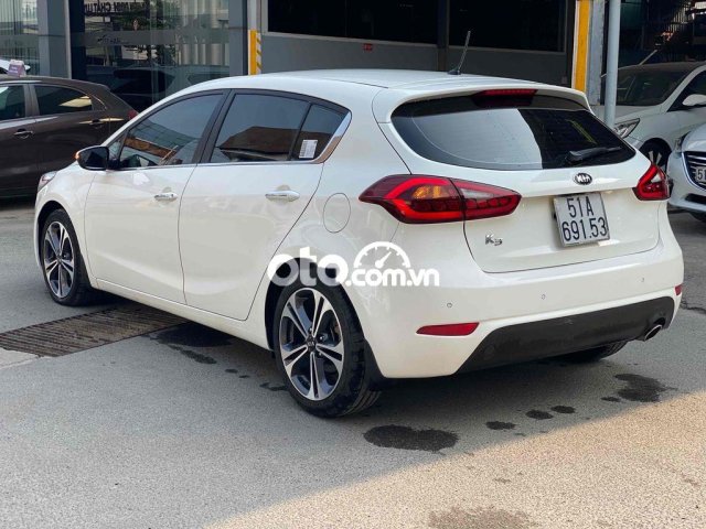 Cerato Hacthback 1.6AT màu trắng nhập 2013 26000km2