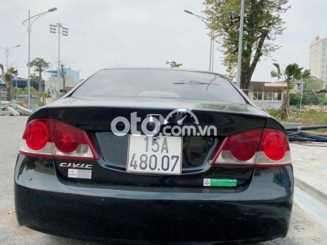 Bán xe Honda Civic 2006 màu đen đang sử dụng0