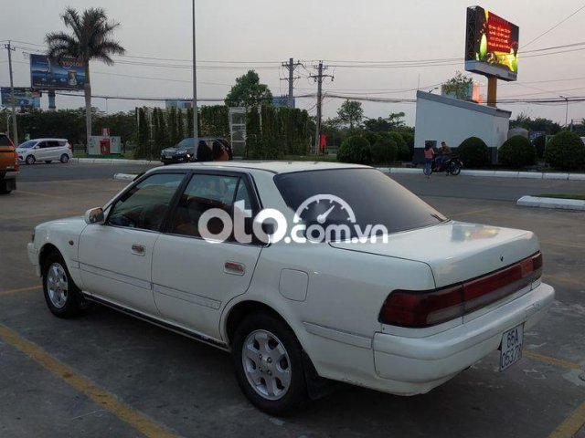 Đi định cư,bán gấp xe gia đình-toyota corona 19910