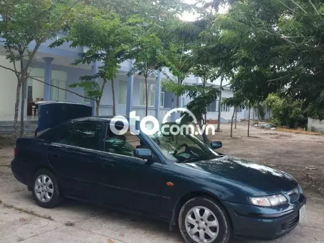 Mazda 626 1999 bao đường xa + máy lạnh tốt0 Mazda 626 1999 bao đường xa + máy lạnh tốt0
