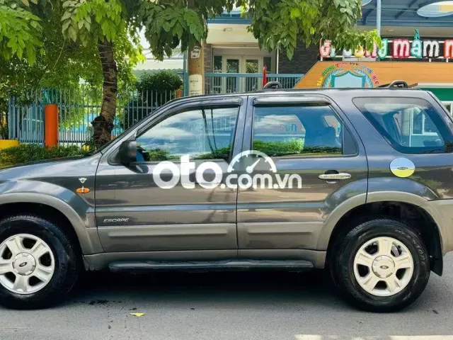 Ford Escape 2003 XLT 3.0 AT 4X4 màu xám nỉ zin0 Ford Escape 2003 XLT 3.0 AT 4X4 màu xám nỉ zin0