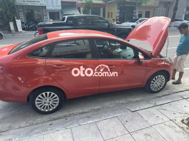 Ford Fiesta 2011 màu cam đỏ đã lăn bánh