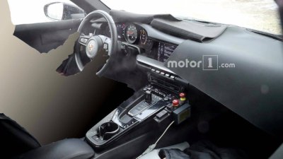 Porsche 911 hoàn toàn mới lộ diện "trần trụi" trên đường thử 8 Porsche 911 hoàn toàn mới lộ diện "trần trụi" trên đường thử a8