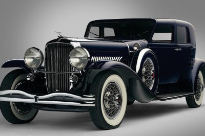 Khám phá 10 logo trên mui xe ấn tượng nhất toàn cầu-Duesenberg Model J 1929 1.